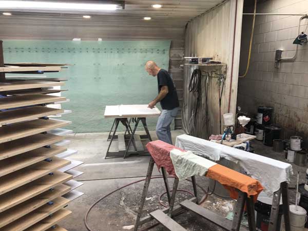 man working in woodworking shop