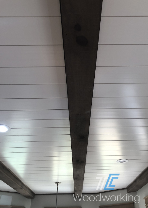 white planked ceiling, dark ceiling beams, recessed lighting